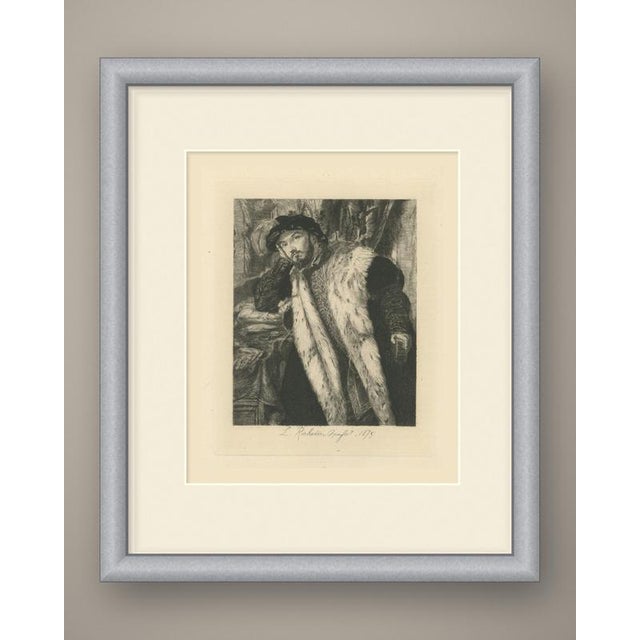 A young nobleman leans with languid elegance against a table, his head resting on his raised right hand. He wears a black...