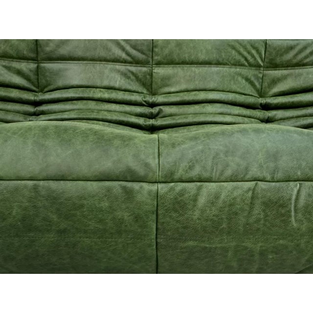 French Three-Seater Togo Sofa in Forest Green Leather by Michel Ducaroy for Ligne Roset, in Restored conditions. Designed...