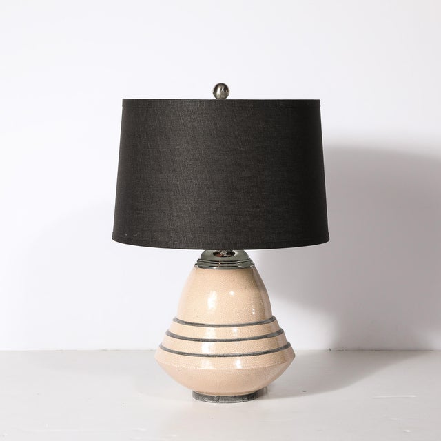 This stunning Art Deco Machine Age table lamp, created in France circa 1930 and signed by Marcel Guillard, embodies the...