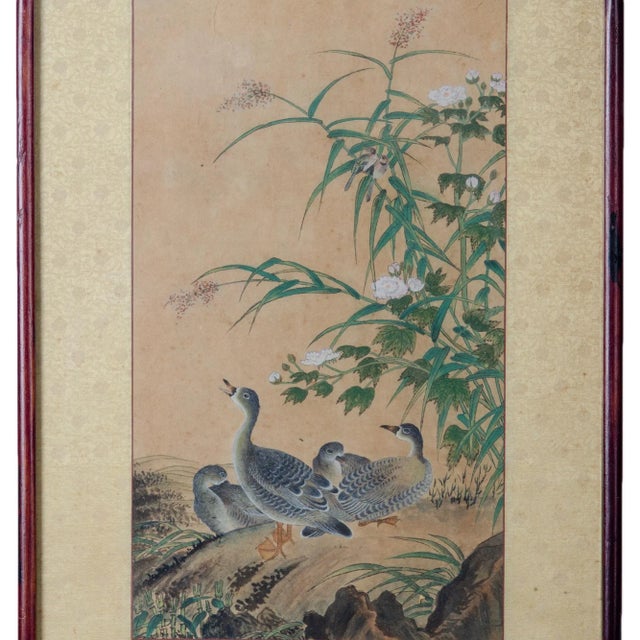 Japanese ducks painting on rice paper with silk mat and hardwood frame. Sight: 9 ¾ by 17 inches Frame: 16 by 23 ½ inches...