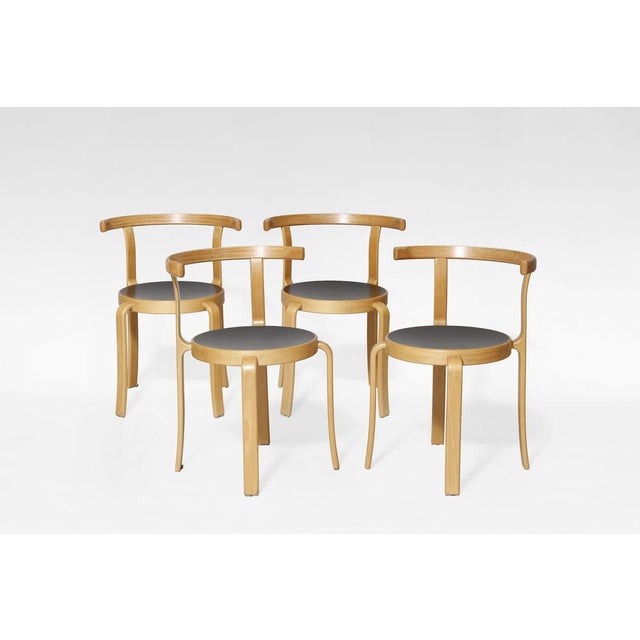 Vintage Model 8000 Dining Chairs designed by Rud Thygesen and Johnny Sørensen for Magnus Olesen, Denmark, in the 1970s....