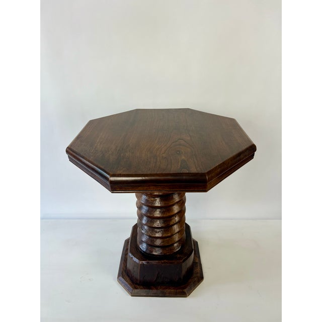 French solid oak brutalist side table in the style of Charles Dudouyt, dating from the 1930-40s. Octagonal top on a very...