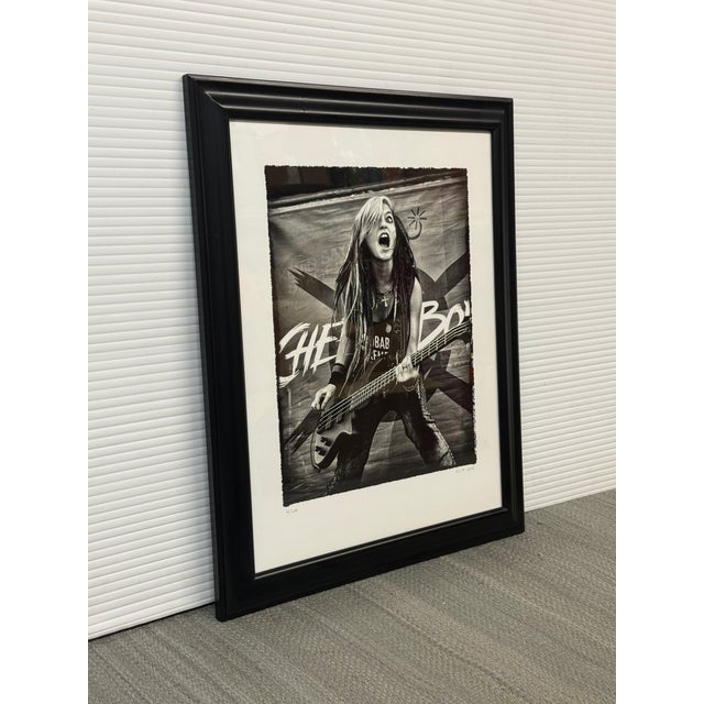 Design Plus Gallery presents a Limited Edition Cherry Bomb Signed Photograph Print by Elsa Hahne. This black-and-white...