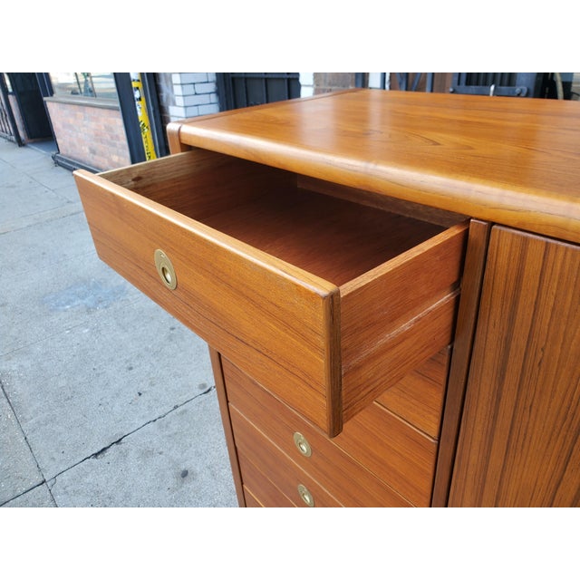 Superb Danish made mid-century dresser/armoire. The left side features seven drawers which all work smooth as butter and...