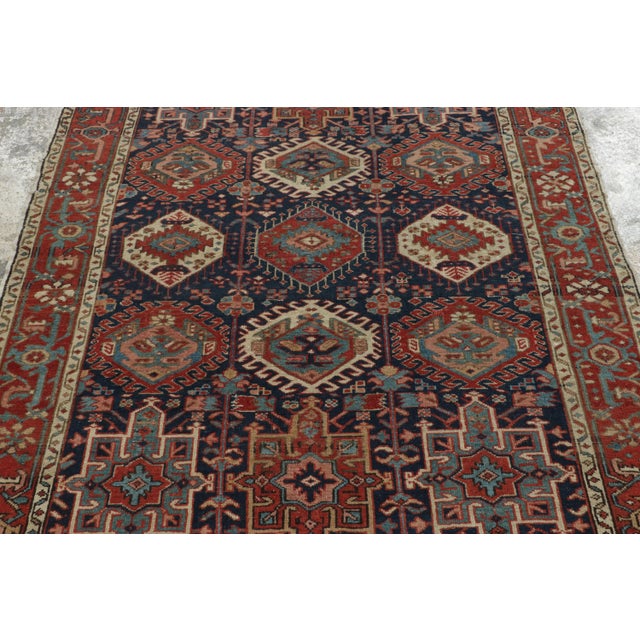 Hand-knotted in premium wool circa 1890-1900, this 5x6 antique Persian rug is a rare and captivating artifact that...