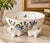 A delightful Italian ceramic centerpiece bowl made for Tiffany & Co. by Este Ceramiche. Raised on three sculptural frogs,...