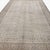 This antique Sivas Turkish rug, more than 100 years old, is distinguished by its soft, neutral palette and elegant allover...
