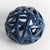 This contemporary little orb is made of thin ceramic strips, which are hand formed, and sparingly shaped into a rounded...