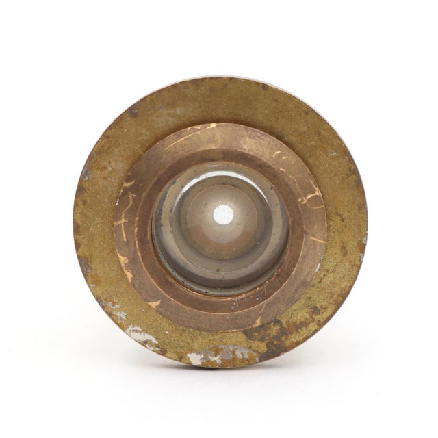 Reclaimed vintage brass peephole with a patina finish. Good condition with surface wear and rust from prior use. One...