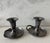 Pair of heavy vintage pewter chamberstick candle holders with a flared drip pan, curled finger-loop handles and removable...