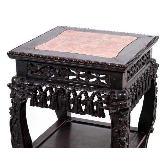 Chinese Carved Hardwood and Marble Two Tier Pedestal Table, late 19th century, mask head cat, legs with claw feet. 32.5" H...