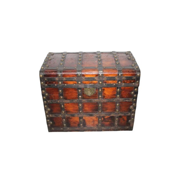 Traveling trunk by P.J. Botto & Co., Louisville, Kentucky. Pine wood with metal straps, original fish shaped lock (non...