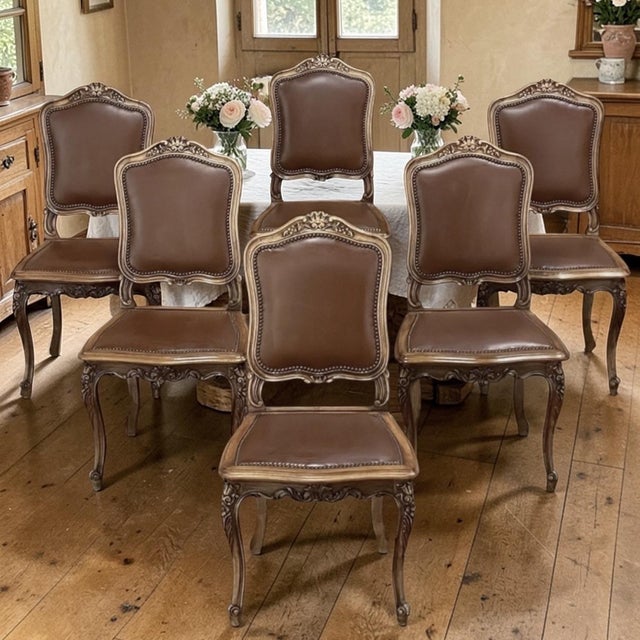 Set of Six Antique French Louis XIV Walnut Dining Chairs reflect an elegant sophistication that is truly timeless!...