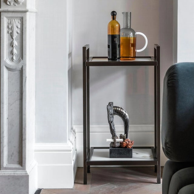 Brother to the Bacco drinks trolley, the Bacco console table possesses the robust lines and masculine glamour that the...