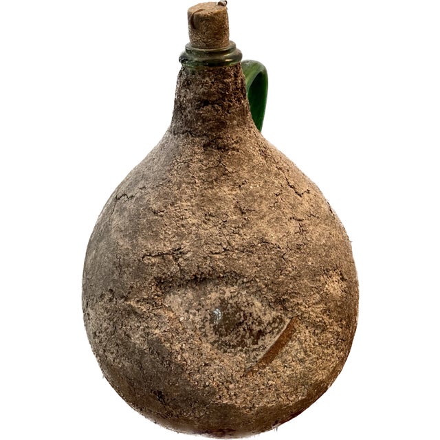 French Vintage Wabi-Sabi Glass Wine Jug – Cement-Crusted with Original Bouchon Celebrate the beauty of imperfection with...