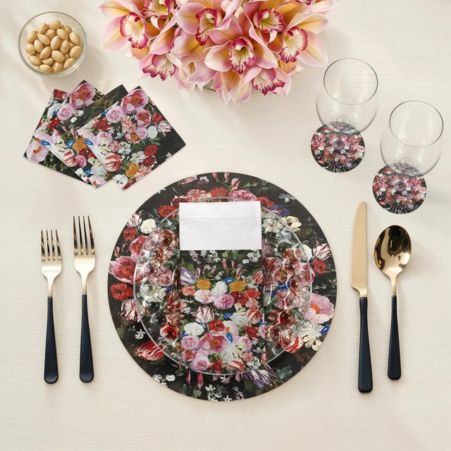 Add an elegant decorative element to any table with our Festoon Flowers Vegan Leather Round Pebble Placemat, inspired by...