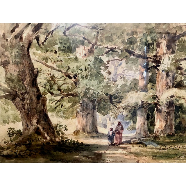 In a way, you are looking into a time capsule. On the face of it, this is a sunny day with two figures in a forest. But...