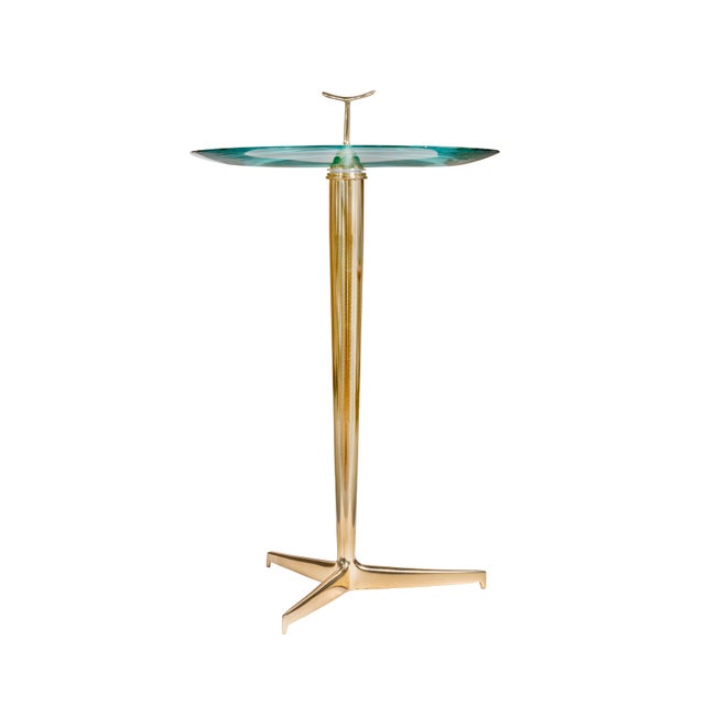 Thick Glass and Brass Coffee Table by Angelo Ostuni, 1960s, in Very Good conditions. Designed 1960 to 1969 This piece is...
