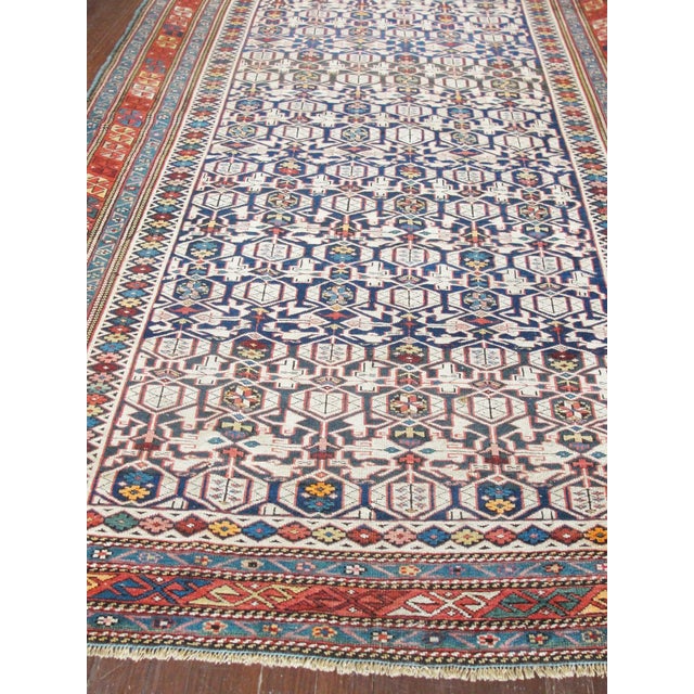 An exceptional late 19th-century Caucasian Kuba-Shirvan rug, measuring 4'5" x 6'10", distinguished by its unusually fine...