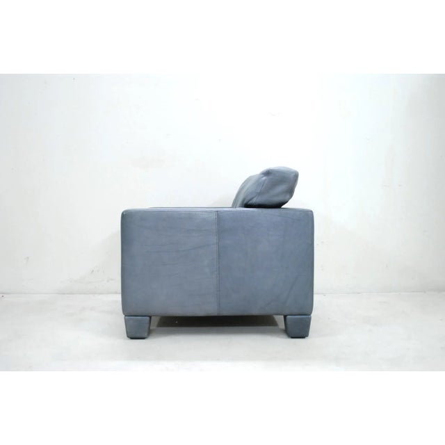 This armchair was produced in Switzerland during the 1980s by De Sede and is made from smooth grey aniline leather. This...