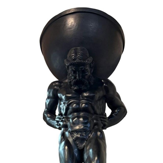 Monumental bronze Atlas bowl sculpture, standing an impressive 95 inches tall. The design draws from Greco-Roman and...
