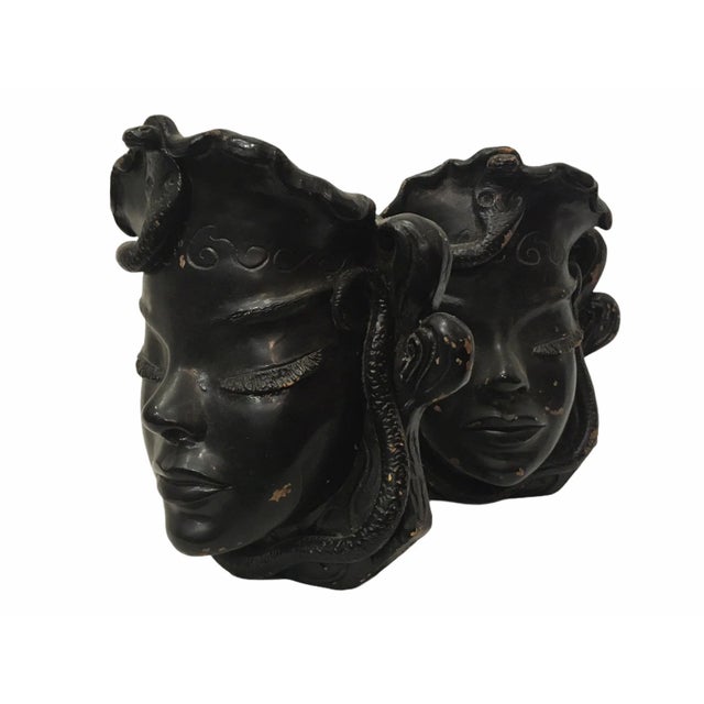 Beautiful pair of Egyptian revival wall sculptures. These Art Deco pieces were manufactured by the now defunct Petty...