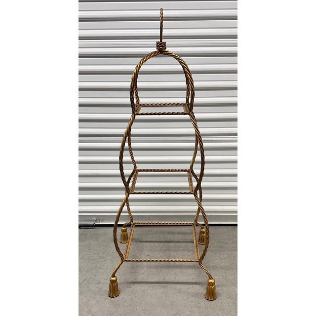 Italian Hollywood Regency Gold Gilt 47" Iron Rope Tassel 3-Tier Etagere Stand Gorgeous 1950s Italian gold tole three-tier...