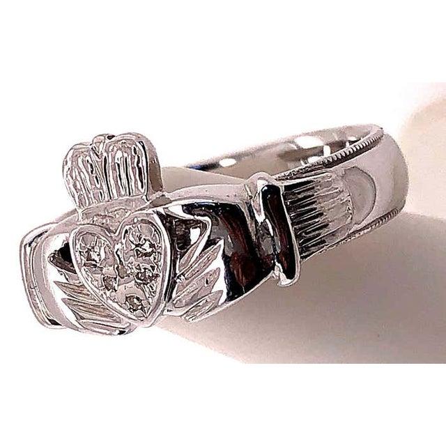 14 Karat White Gold Claddagh Ring with Round Diamonds. Claddagh ring is a traditional Irish ring which represent love,...