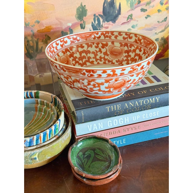 Beautiful vintage Mid Century Chinoiserie decorative bowl in an incredible shade of rusty burnt orange with a white...