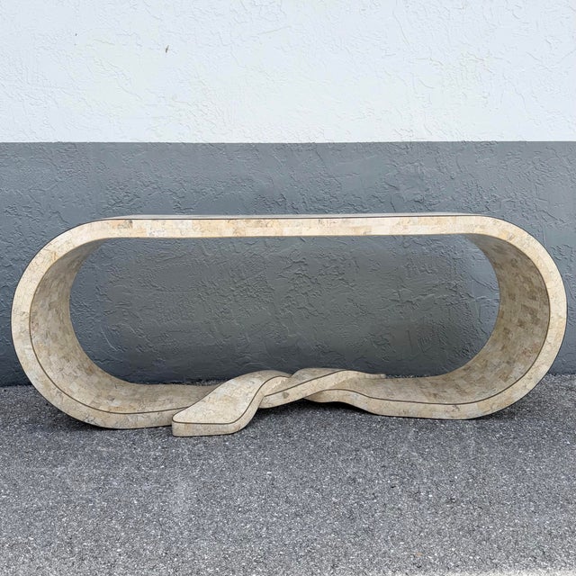 The ribbon protrudes the depth of the tables making the total depth 19” This exceptional Postmodern console table by...