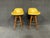 Here is a killer pair of vintage mid century bar stools by Chet Beardsley. Original yellow vinyl fabric is in great...