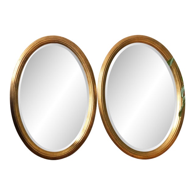 Pair of Vintage Deknudt Giltwood Oval Beveled Mirrors – Hollywood Regency, Belgium, 1970s For Sale