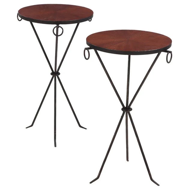 Having round inset mahogany radial veneer top and ring decorated apron supported by an iron tripartite base. perfect...