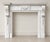 A fine pair of large antique Edwardian white marble fireplaces, dating to circa 1901, each beautifully carved and of...
