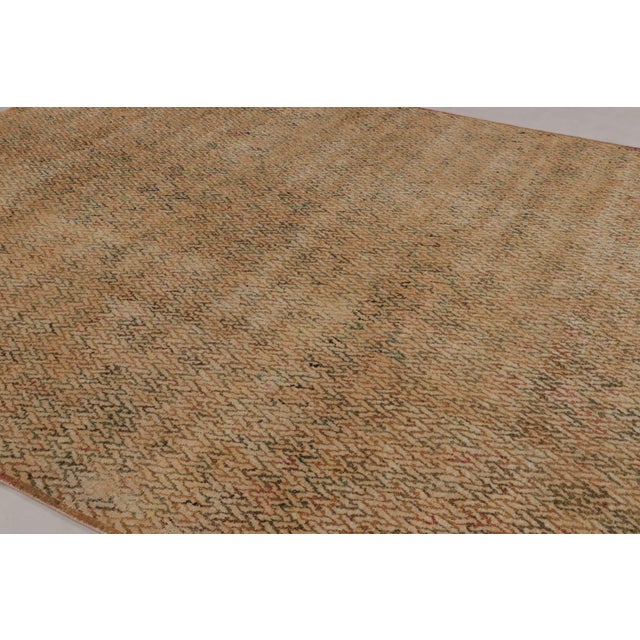 This wool 9x12 rug is a new addition to Rug & Kilim’s Modern Collection and features both a luxurious blend of hand-...