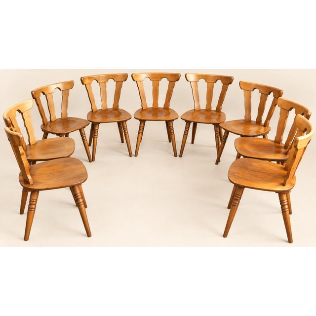 A set of rustic bistro-style chairs, likely of central european origin (switzerland, austria, or germany), dating from the...