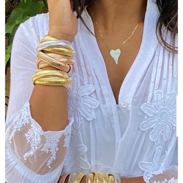 Estate"H Gold" Tri color Interwoven Rolling Stretch Bracelet 7" This iconic three-strand bracelet is handmade from a...