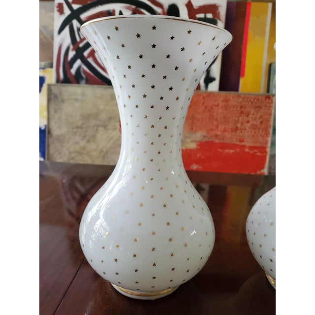 A rare pair of Baccarat style gilt star gold decorated opaline vases. Circa 1900 with factory holes on the bottom of each...