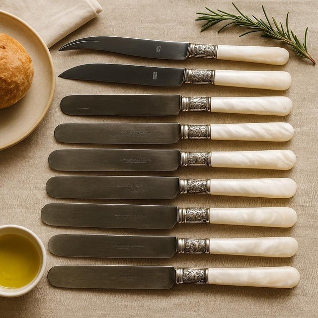 A Charming Addition to Your Tableware Collection Elevate your dining presentation with this two-part set of knives, each...