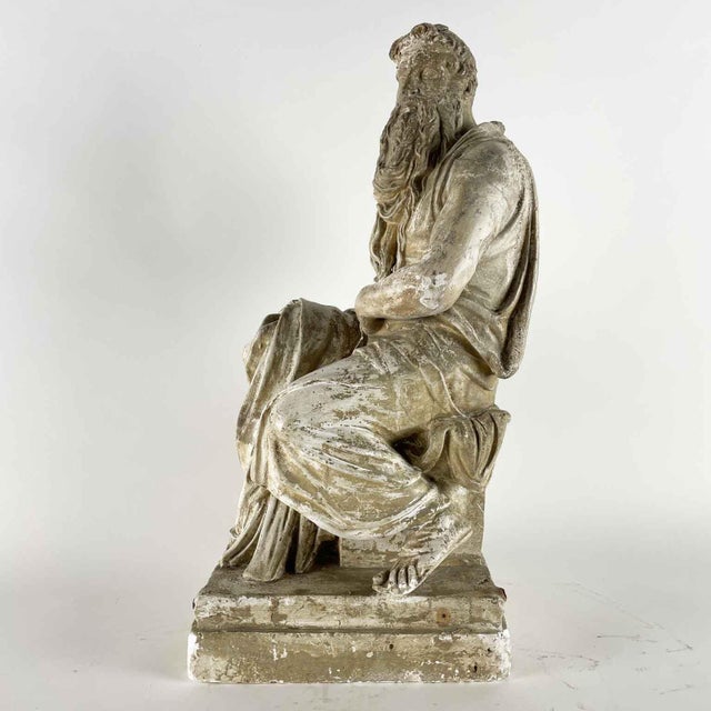 Italian Plaster Sculpture of Moses Inspired by Michelangelo, Early 1900s. This plaster work recreates one of the...