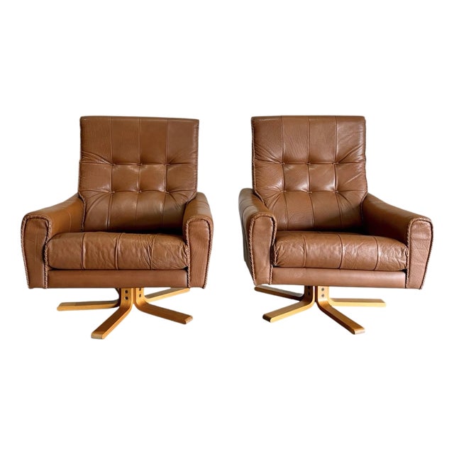 Mid Century Caramel Leather and Beech Swivel Chairs, Baseball Glove Stitching, 2 Pieces For Sale