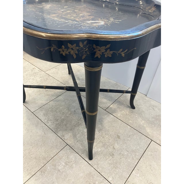 This papier-mâché tray was made in England in the nineteenth century The quality custom table fits the tray perfectly And...