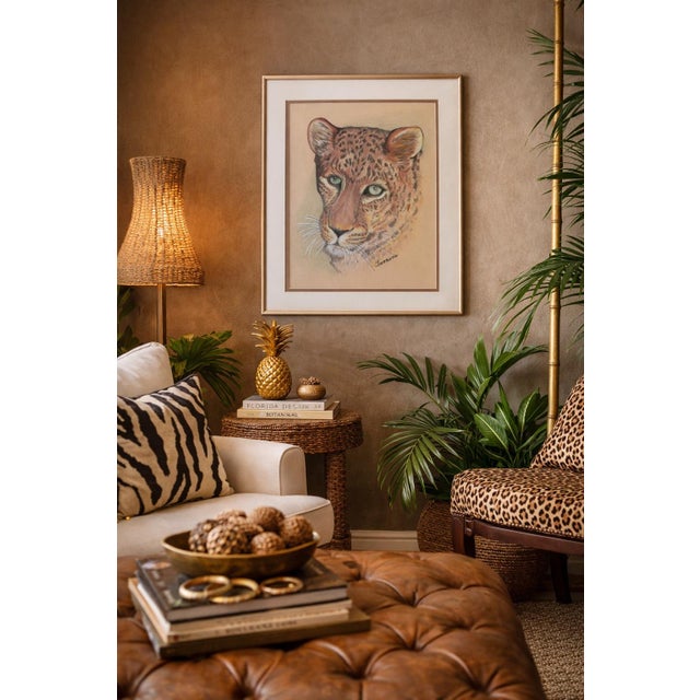 A striking vintage pastel portrait depicting a leopard in close-up, beautifully rendered with expressive detail and soft...