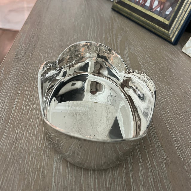 Beautiful scalloped edge oval sterling silver bowl room accent piece. Market Suat 900 or 950.
