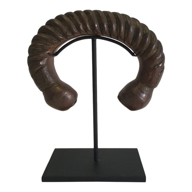 Antique Bronze Twisted African Currency Band on Stand For Sale
