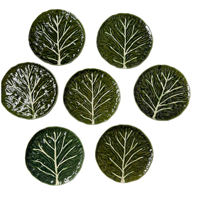 This is a set of seven Olfaire faianças cabbage leaf dinner plates. These are beautifully hand crafted in Portugal. They...