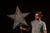 A bold five-point punched-tin star fitted with a long mounting post, originally designed to glow from within. Each panel...
