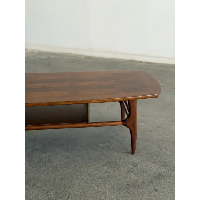 W60 D19 H14 Fully restored low profile coffee table. I don’t features, exceptional details like contrasting inlay , brass...