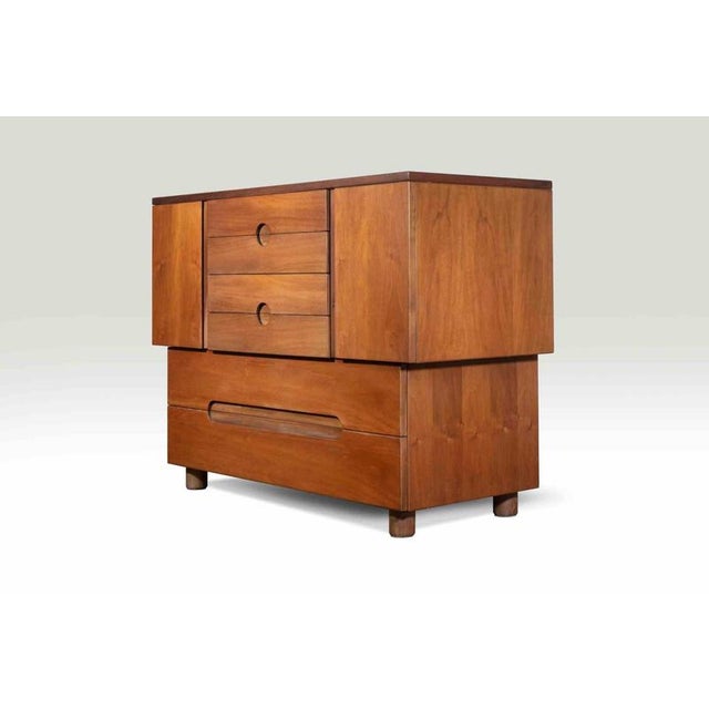Chest of drawers model "Serena" realized by Giovanni Michelucci for Poltronova in 1955. Realized in walnut wood and in...