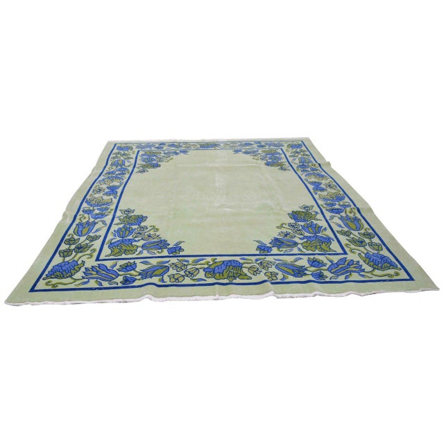 Hand-knotted with care using traditional rug-making techniques, this wool rug blends timeless craftsmanship with a modern...